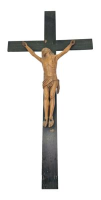 wooden crucifix with jesus on the cross on a white background