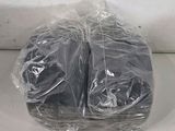 a close up of two pieces of plastic wrapped in plastic