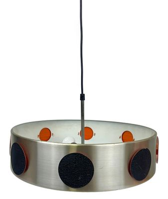 a lamp that is hanging from the ceiling in the room