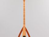 an image of a musical instrument hanging from a string