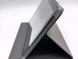 a tablet that is sitting on top of a stand