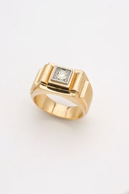 an image of a gold ring with a square diamond in the center