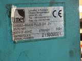 a label on the back of a machine that is sitting on a table