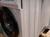 an image of a washer and dryer sitting on a pallet