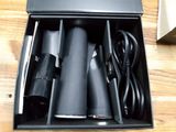 a black box with a hair dryer and a charger in it