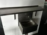 an image of a kitchen with a sink and a counter