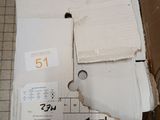 a cardboard box with a piece of paper on top of it