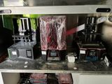 a picture of a kitchen with a bunch of items on the counter