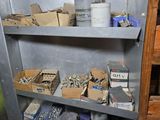 a metal shelving with lots of boxes and other items on it