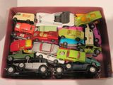 a box full of toy cars and trucks in it