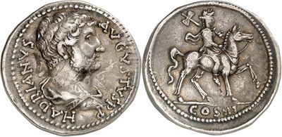 a silver coin with an image of a man on a horse