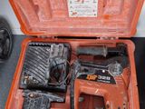 an orange tool case with tools in it on the floor