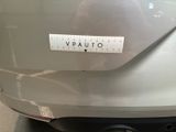 a sticker that says voauto on the back of a car