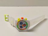 a plastic watch with a mickey mouse face on it