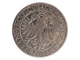 an image of a silver coin with an eagle on it