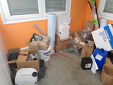 a room with a lot of boxes and boxes on the floor