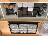a lot of boxes that are sitting on a shelf