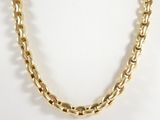 a close up of a gold chain necklace on a mannequin mannequin mannequin mannequin mannequin mannequin mannequin mann