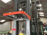 a fork lift truck in a warehouse with other equipment