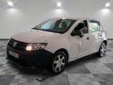 a picture of a white dacia parked in a garage