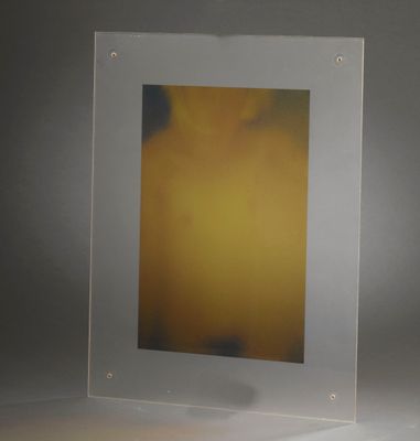 a picture of a picture in a glass frame on a table