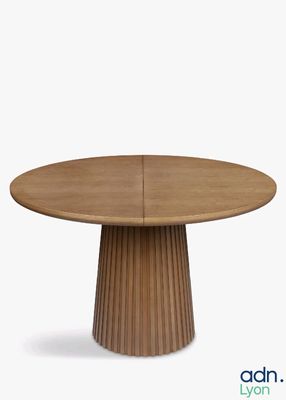 an image of a round wooden table with a circular base