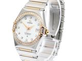 an image of a lady ' s wrist watch with a diamond bezel