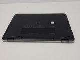 a black laptop with a small battery in it