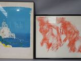 two framed art pieces on the wall of a room
