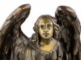 statue of an angel with wings on a pedestal on a white background