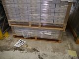 a large stack of boxes on a pallet in a warehouse