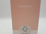 une boîte rose sur laquelle figure le visage d'une femme