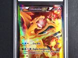 a close up of a pokemon card in a plastic case