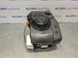 a gray blower sitting on top of a table in front of a wall