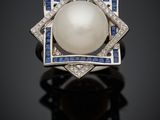 une bague Art déco sertie de perles et de diamants