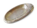 a picture of a stone bowl on a white surface