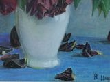 a painting of flowers in a white vase on a blue table