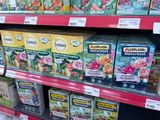 many boxes of tea on the shelf in the store