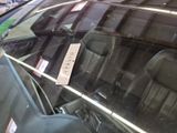 a sticker on the windshield of a car with a price tag on it