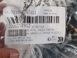 a person holding a plastic bag with a barcode on it