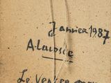 an old book with writing on it sitting on a table