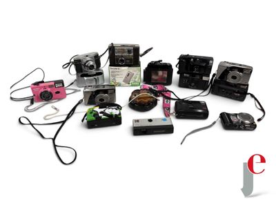many different types of cameras on a white surface