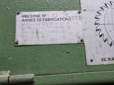 a machine that has a sign on the side of it