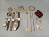 many different types of watches and bracelets laid out on a table
