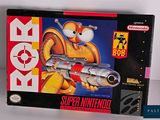 a box that has a toy gun in it