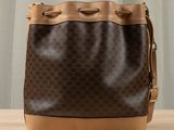 louis vuitton bucket bag in monogram canvas and leather