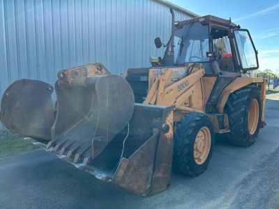 an image of a tractor that is parked in front of a building