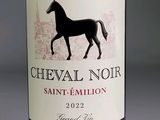 a bottle of wine with a horse on the label