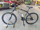a bicycle that is parked in a garage
