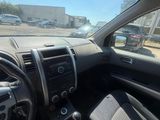 the interior of a car with a steering wheel and dashboard